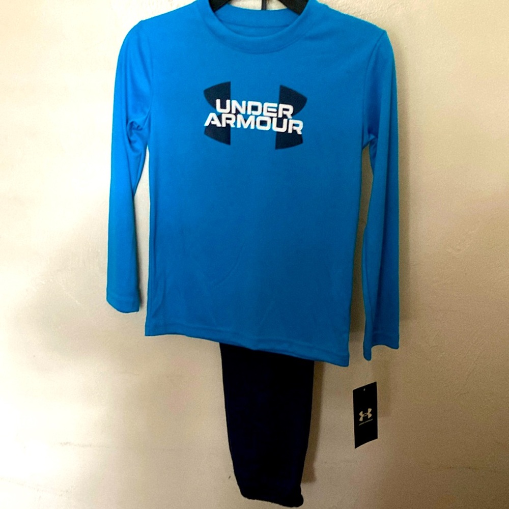 Under Armour logo graphic in Tee and pants set. Size 6 Raglan long sleeve.